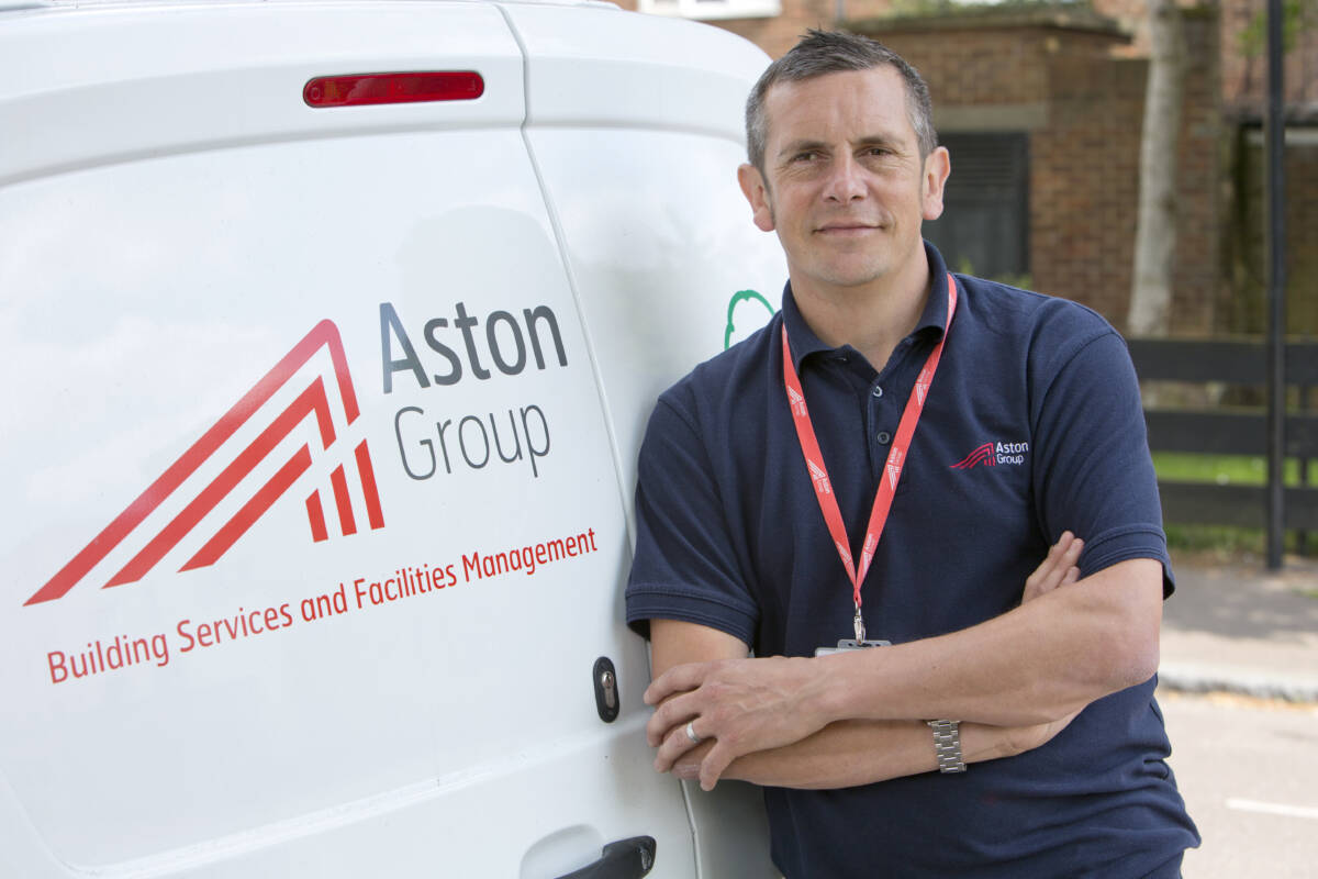 Gas engineer by a van